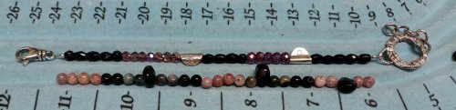 Judy Larson's Using Lower Quality Beads - , Wire Jewelry Design, Design, Beads, Decide where to position three faceted drops on the strand.